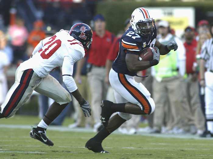 Oct 27, 2007; Auburn, AL, USA; Ole Miss Rebels Johnny Brown (20) chases down Auburn runningback Mario Fannin (27) during the first half at Jordan Hare Stadium in Auburn. The Tigers beat the Rebels 17-3. Mandatory Credit: John Reed-USA TODAY Sports
